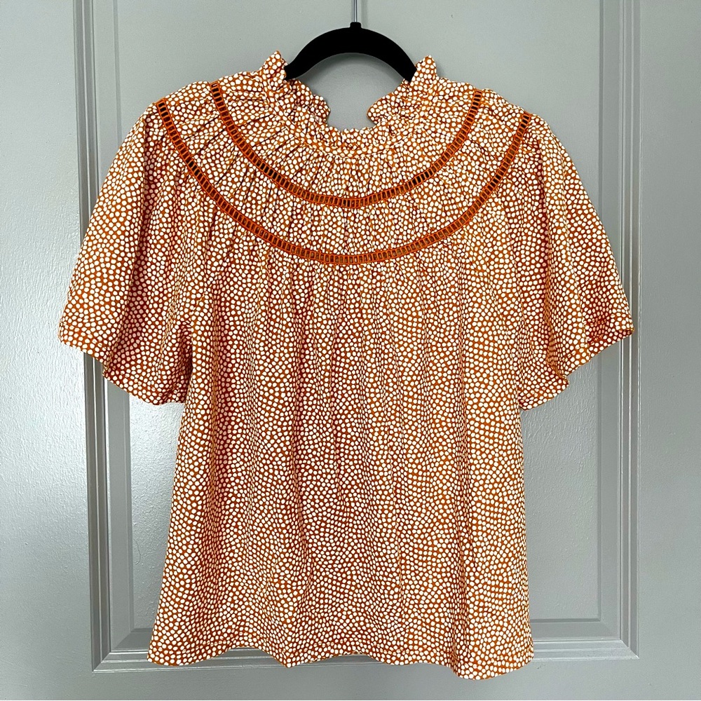 Ann taylor orange blouse.